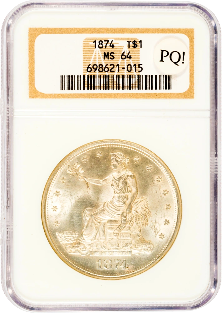 Trade dollar silver coin graded by a numismatist
